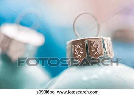 Picture - Blue christmas baubles, close up. Fotosearch
