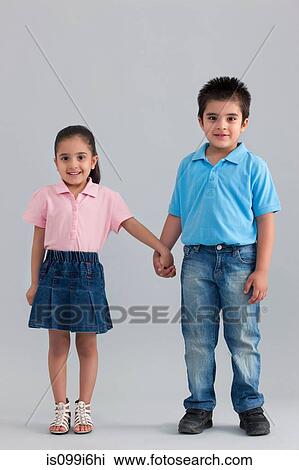 Brother and sister holding hands View Large Photo Image Stock Image - Brother and sister holding hands. Fotosearch