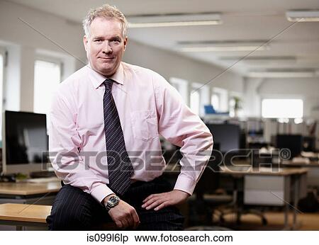 Stock Photography - Businessman in office. Fotosearch