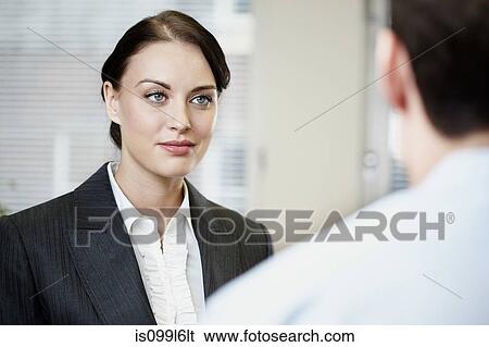 Businesswoman and colleague View Large Photo Image Stock Photograph - Businesswoman and colleague. Fotosearch