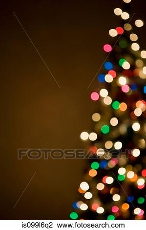 Christmas lights on tree, out of focus View Large Photo Image Stock Image - Christmas lights on tree, out of focus. Fotosearch