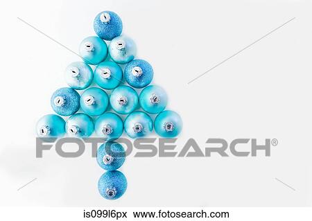Christmas tree made of blue christmas baubles View Large Photo Image Stock Photo - Christmas tree made of blue christmas baubles. Fotosearch