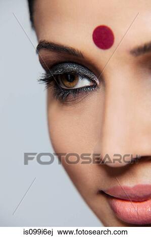 Close-up of a beautiful woman with a bindi View Large Photo Image Stock Image - Close-up of a beautiful woman with a bindi. Fotosearch
