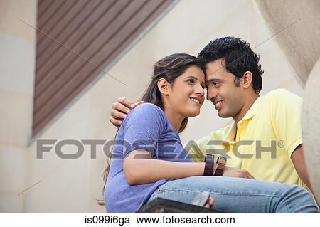 Stock Image - Couple getting close. Fotosearch