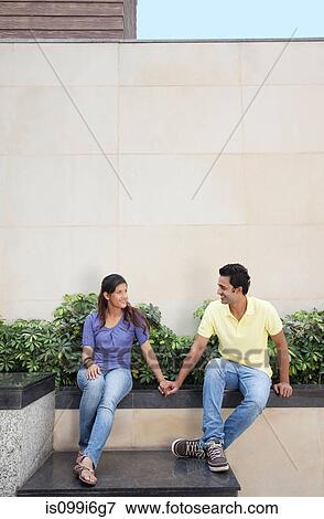 Couple holding hands View Large Photo Image Stock Photo - Couple holding hands. Fotosearch