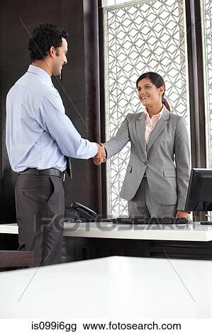 Executives shaking hands View Large Photo Image Stock Image - Executives shaking hands. Fotosearch