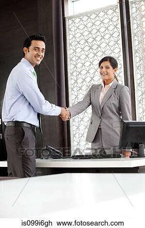 Executives shaking hands View Large Photo Image Stock Image - Executives shaking hands. Fotosearch