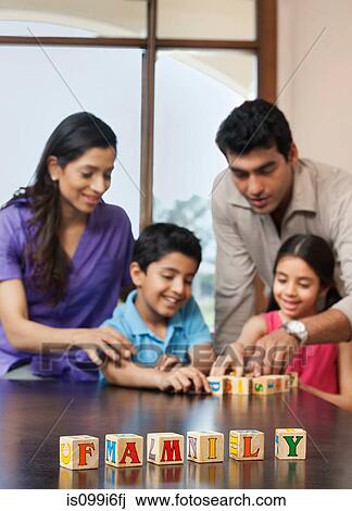 Family playing with building blocks View Large Photo Image Stock Image - Family playing with building blocks. Fotosearch