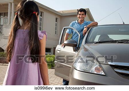 Father looking at his daughter View Large Photo Image Stock Photo - Father looking at his daughter. Fotosearch