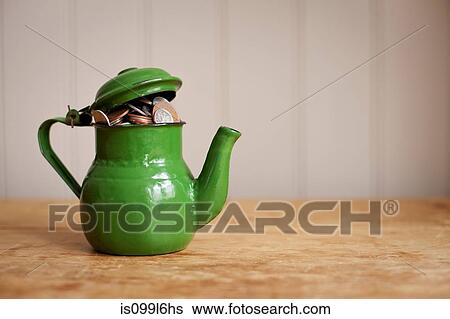 Money in a teapot View Large Photo Image Stock Photograph - Money in a teapot. Fotosearch