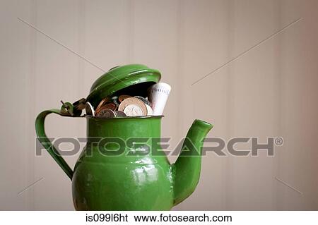 Money in a teapot View Large Photo Image Stock Photograph - Money in a teapot. Fotosearch