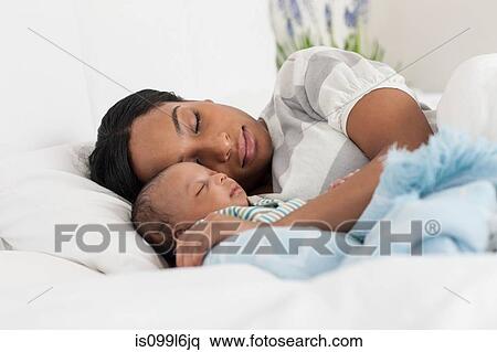 Mother and baby sleeping View Large Photo Image Stock Photography - Mother and baby sleeping. Fotosearch