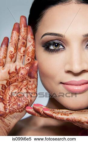 Portrait of a beautiful woman with mehndi View Large Photo Image Stock Photography - Portrait of a beautiful woman with mehndi. Fotosearch