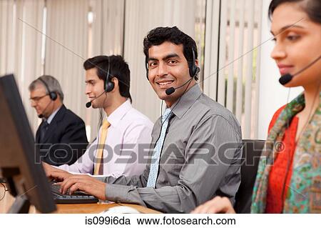Portrait of a call center agent View Large Photo Image Stock Image - Portrait of a call center agent. Fotosearch