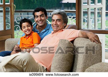 Portrait of a family on a sofa View Large Photo Image Picture - Portrait of a family on a sofa. Fotosearch