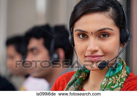 Portrait of a female call center agent View Large Photo Image Stock Image - Portrait of a female call center agent. Fotosearch