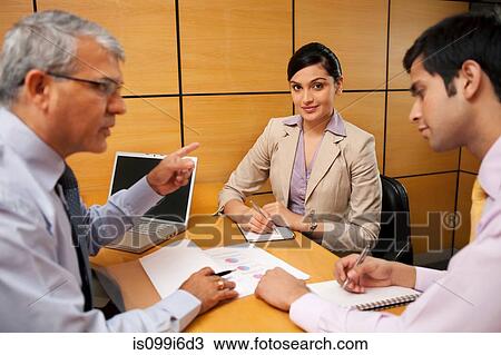 Stock Image - Portrait of a female executive. Fotosearch