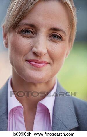 Portrait of a female executive View Large Photo Image Stock Image - Portrait of a female executive. Fotosearch