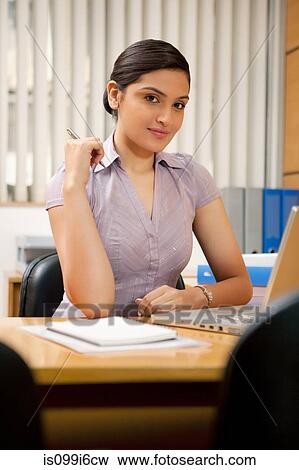 Portrait of a female executive View Large Photo Image Stock Photo - Portrait of a female executive. Fotosearch