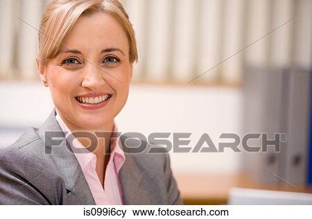 Stock Photo - Portrait of a female executive. Fotosearch