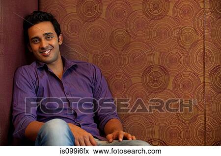 Stock Photo - Portrait of a man smiling. Fotosearch
