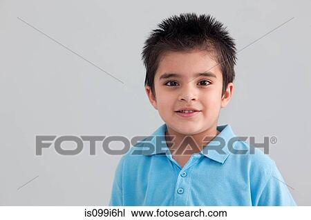 Stock Image - Portrait of a young boy. Fotosearch