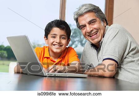 Portrait of grandfather and grandson View Large Photo Image Stock Image - Portrait of grandfather and grandson. Fotosearch