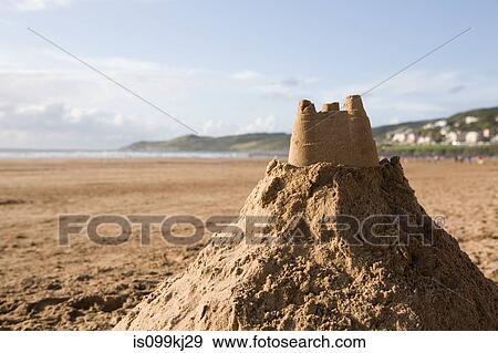 Sand castle on a beach View Large Photo Image Stock Photo - Sand castle on a beach. Fotosearch
