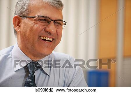 Senior businessman smiling View Large Photo Image Stock Image - Senior businessman smiling. Fotosearch