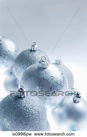 Stock Photo - Silver christmas baubles. Fotosearch
