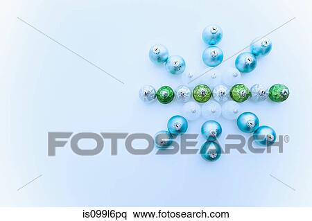 Stock Photography - Snowflake made of christmas baubles. Fotosearch