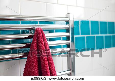 Towel hanging on a rail in bathroom View Large Photo Image Stock Image - Towel hanging on a rail in bathroom. Fotosearch