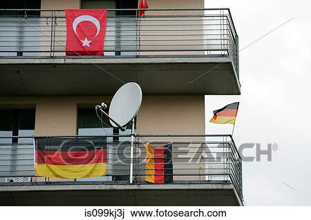 Stock Image - Turkish and German flags on balconies, Kreuzberg, Berlin, Germany. Fotosearch