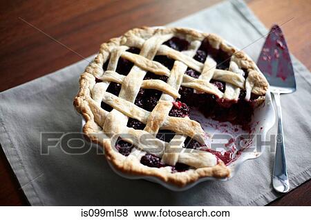 Blackberry pie with missing slice View Large Photo Image Stock Photo - Blackberry pie with missing slice. Fotosearch