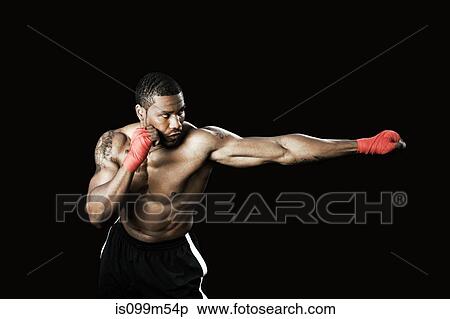 Boxer punching View Large Photo Image Stock Photography - Boxer punching. Fotosearch