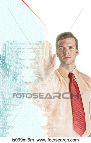 Picture - Businessman becoming pixelated. Fotosearch