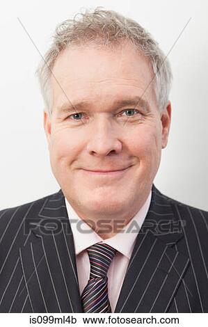 Businessman smiling, portrait View Large Photo Image Stock Image - Businessman smiling, portrait. Fotosearch