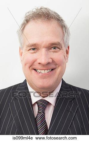 Businessman smiling, portrait View Large Photo Image Stock Image - Businessman smiling, portrait. Fotosearch