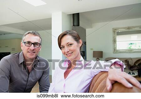 Businesspeople on sofa, portrait View Large Photo Image Stock Image - Businesspeople on sofa, portrait. Fotosearch