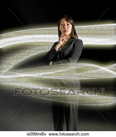 Businesswoman looking at data streams View Large Photo Image Stock Photo - Businesswoman looking at data streams. Fotosearch