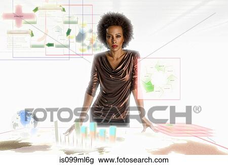 Businesswoman surrounded by holographic objects View Large Photo Image Stock Image - Businesswoman surrounded by holographic objects. Fotosearch