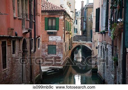 Stock Image - Canal and buildings, venice, italy. Fotosearch