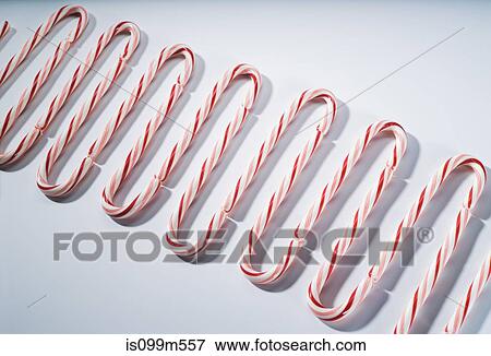 Candy canes in a row View Large Photo Image Stock Photo - Candy canes in a row. Fotosearch