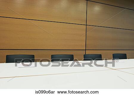 Conference table in empty office block View Large Photo Image Stock Photography - Conference table in empty office block. Fotosearch