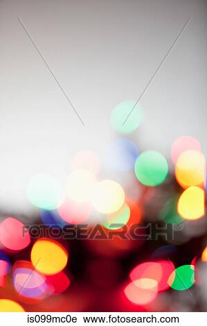 Stock Image - Defocussed multi colored lights. Fotosearch