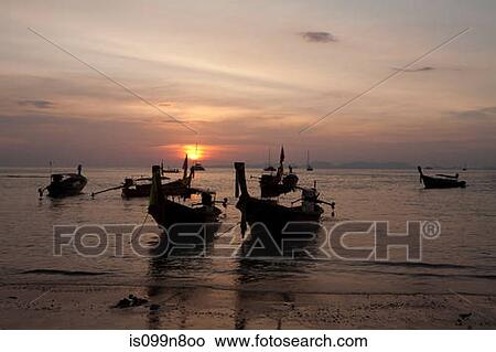 Fishing boats moored on Krabi Island, Thailand View Large Photo Image Picture - Fishing boats moored on Krabi Island, Thailand. Fotosearch