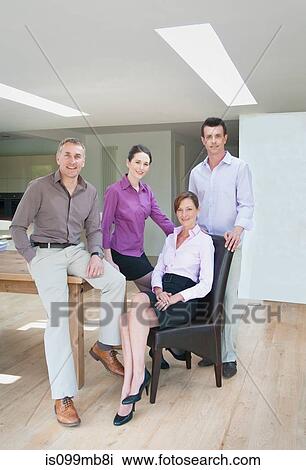 Four businesspeople, portrait View Large Photo Image Stock Image - Four businesspeople, portrait. Fotosearch
