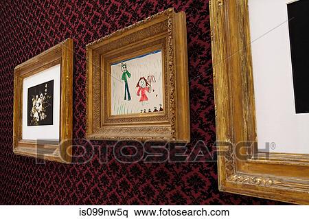 Framed artworks on patterned gallery wall View Large Photo Image Stock Photography - Framed artworks on patterned gallery wall. Fotosearch