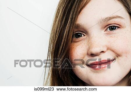 Stock Image - Girl looking at camera. Fotosearch