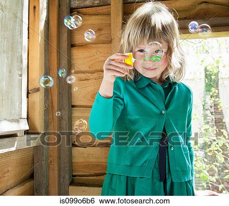 Girl playhouse with bubbles View Large Photo Image Stock Photograph - Girl playhouse with bubbles. Fotosearch